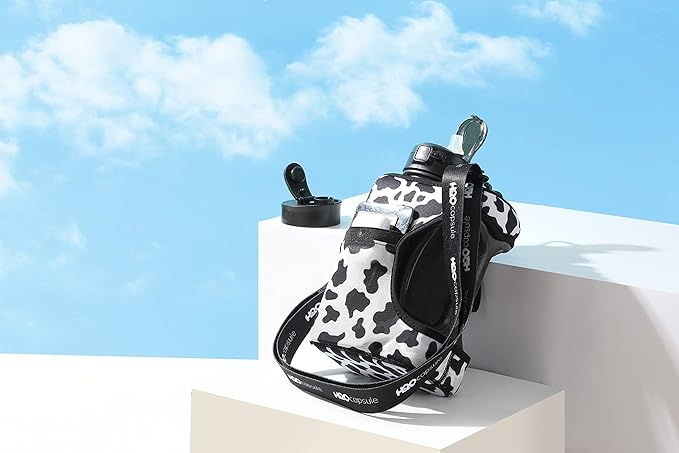 H2O Capsule Half Gallon Cube Square Water Bottle - 2.2L Water Bottle with Strap, Storage Sleeve, Covered Straw and Chug Lid – BPA Free Reusable Sports Water Jug with Handle, (68 Ounce), (Cow)