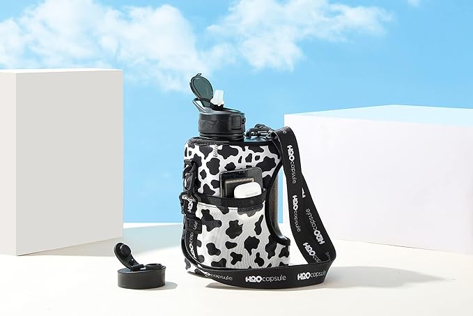 H2O Capsule Half Gallon Cube Square Water Bottle - 2.2L Water Bottle with Strap, Storage Sleeve, Covered Straw and Chug Lid – BPA Free Reusable Sports Water Jug with Handle, (68 Ounce), (Cow)
