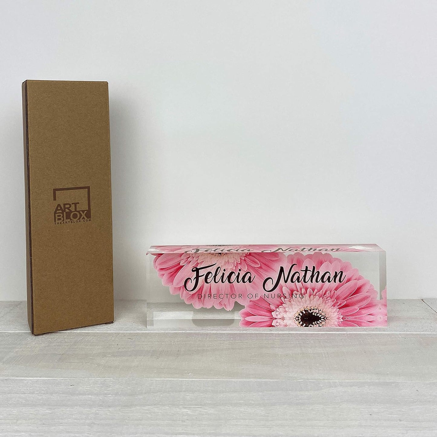 Artblox Office Desk Name Plate Personalized | Custom Name Plates for Desks | Pink Daises Design On Clear Acrylic Glass | Office Desk Decor - (8" x 2.5")