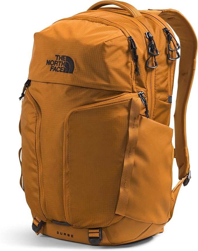 THE NORTH FACE Surge Commuter Laptop Backpack | Daypack with Water Repellent Finish, 16" Laptop Sleeve, Reflective Details, Timber Tan, One Size